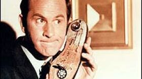 Don Adams as Maxwell Smart, with the shoe phone, one of an assortment of gag props that lampooned James Bond's fabulous arsenal.