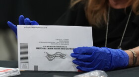 FILE — An election worker sorts vote-by-mail ballots at the Miami-Dade County Supervisor of Elections Office for the Florida primary election in Doral, Fla., Aug. 18, 2026.