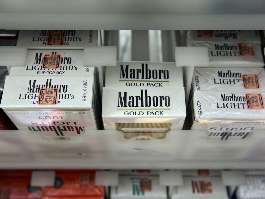 In this 2010 file photo, a pack of Marlboro cigarettes is seen at the Quick Stop store in Miami, Fla. Philip Morris International's CEO Jacek Olczak said the company will stop selling Marlboro cigarettes in the U.K. in the next 10 years.