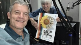 Tim Bascom, Kaye McIntyre with Kansas Book Festival poster