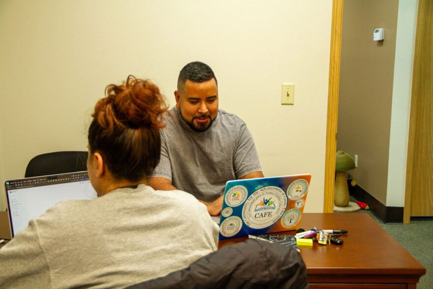 Left to right Angelica Garcia-Macias, and Yametzin "Metz" Chacón work in CAFÉ's new building at 620 Lewis Street.