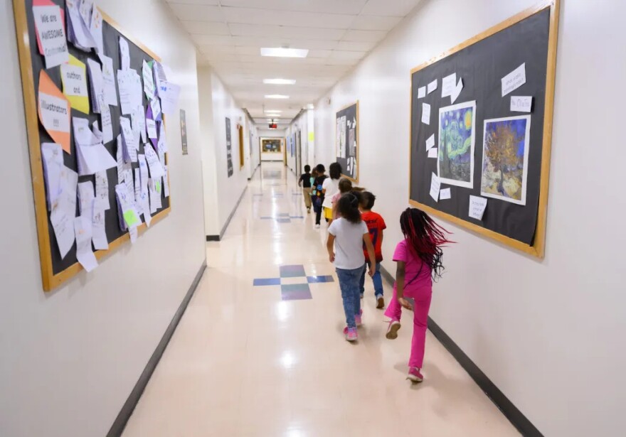 Centennial Elementary School first graders walk back to their classroom after being in Ann Merwede’s STEAM (Science, Technology, Engineering, the Arts and Mathematics) class Sept. 7, 2023 in Colorado Springs.