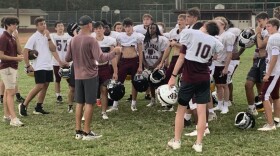 Head Coach R.J. Fuhr addresses his team after practice in preparation for a game against Eagle’s View (Jacksonville). (Trey Johnson/WUFT News)