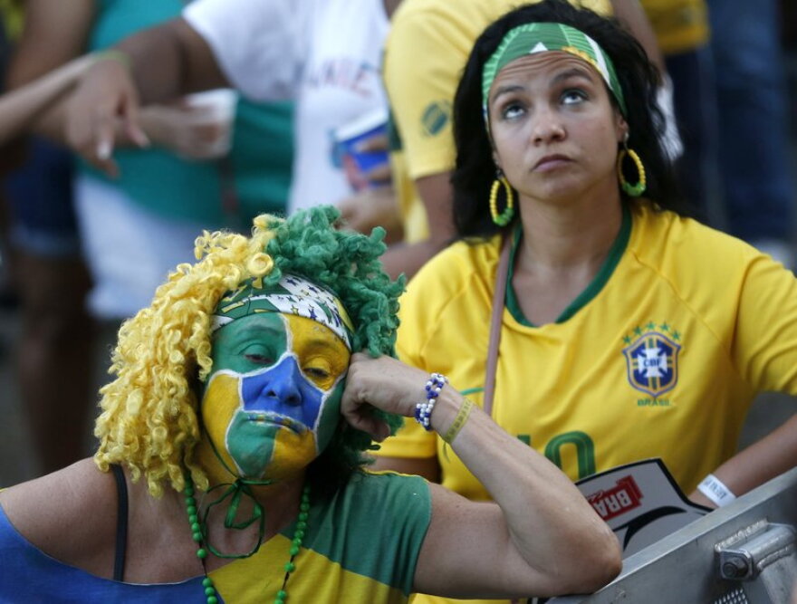 ONCE PROUD: Dejected Brazilian fans after their team's loss to Belgium last week at the World Cup in Russia.