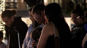 Community members attend a vigil in honor of Paisley Brown.