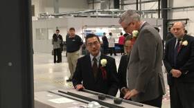 Gov. Eric Holcomb at the ribbon-cutting ceremony for M&C Tech in Washington, Indiana.