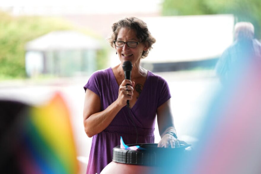 Malinda Clatterbuck speaks during a rally against Independence Law Center that took place under the parking deck before Penn Manor school board meeting on Monday, August 19, 2024.