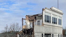 Demolition continues Tuesday on the Tobin building in downtown Pekin. The Arcade building next door on Capitol Street was demolished earlier.