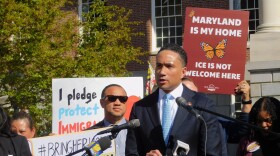 Sen. Will Smith speaks at a We Are CASA rally in support of the Community Trust Act on Friday outside the Maryland State House in Annapolis, Md.