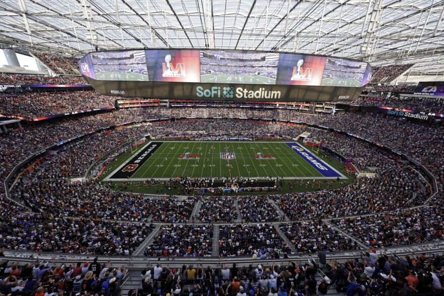 The Cincinnati Bengals kick the opening kick-off to the Los Angeles Rams during the NFL Super Bowl 56 football game Sunday, Feb. 13, 2022, in Inglewood, Calif. (AP Photo/Adam Hunger)