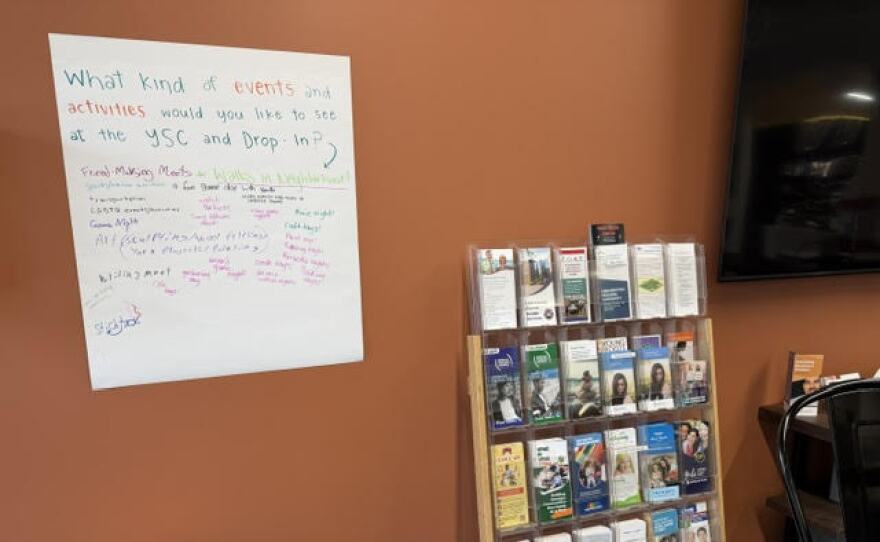 Resource pamphlets and a sign asking what events young people would like the service center to hold, Jan. 26, 2026. 