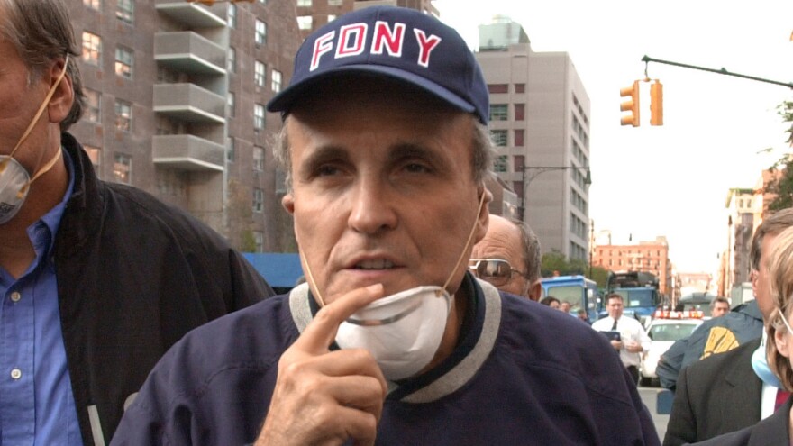 New York City Mayor Rudy Giuliani tours the site of the World Trade Center disaster on Sept. 12, 2001.