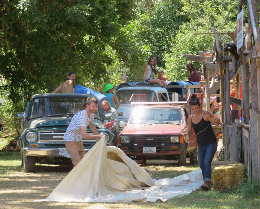 Vendors, staff, and volunteers get things moving at the Oregon Country Fair ahead of opening day.
