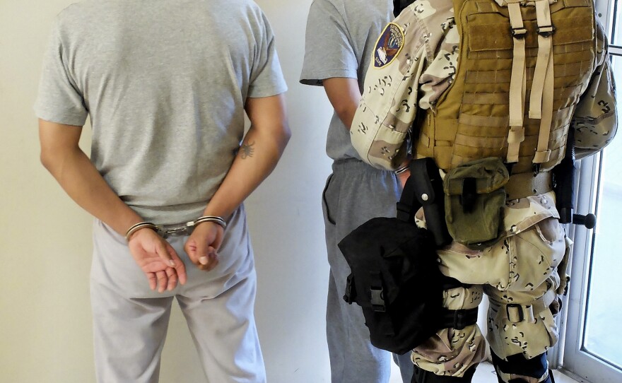 Two of the 17 men who are being held in a Tijuana prison on charges that they were digging a tunnel that was intended to reach the U.S.