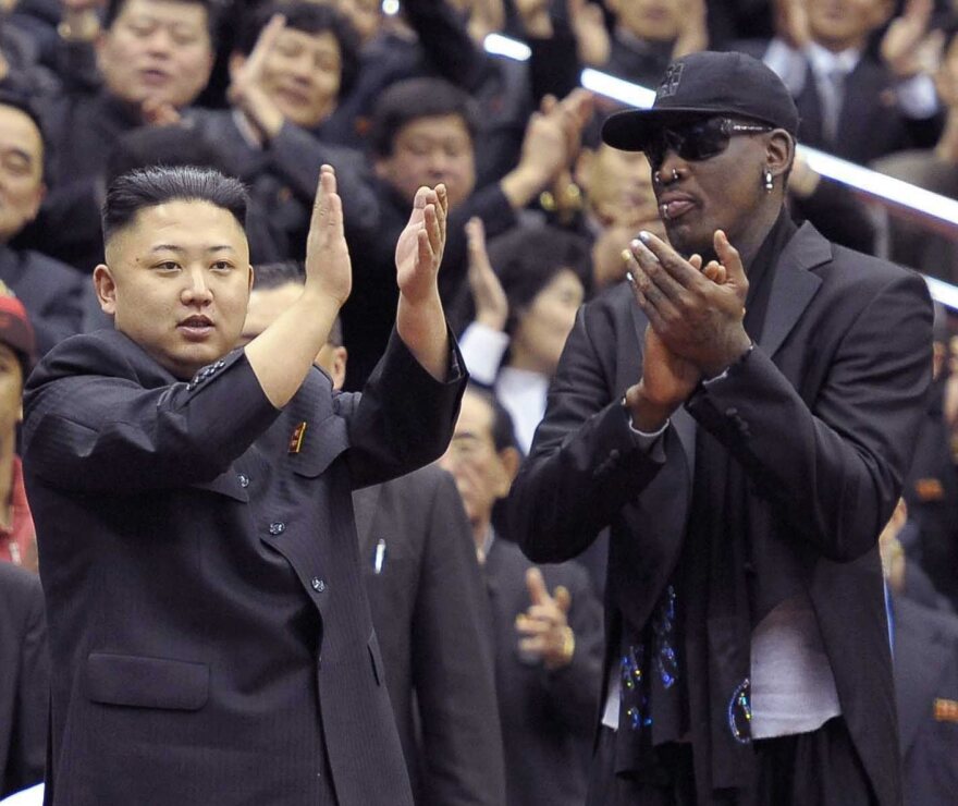 Dennis Rodman, in black hat and shades, with North Korean leader Kim Jong Un at a Feb. 28 basketball game in Pyongyang.