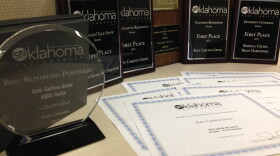 Some of the awards received by KGOU in the spring of 2015.