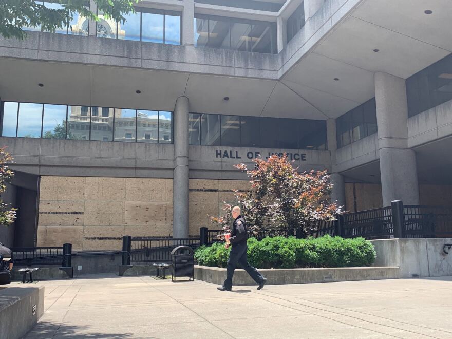 The Hall of Justice downtown was boarded up on Thursday.