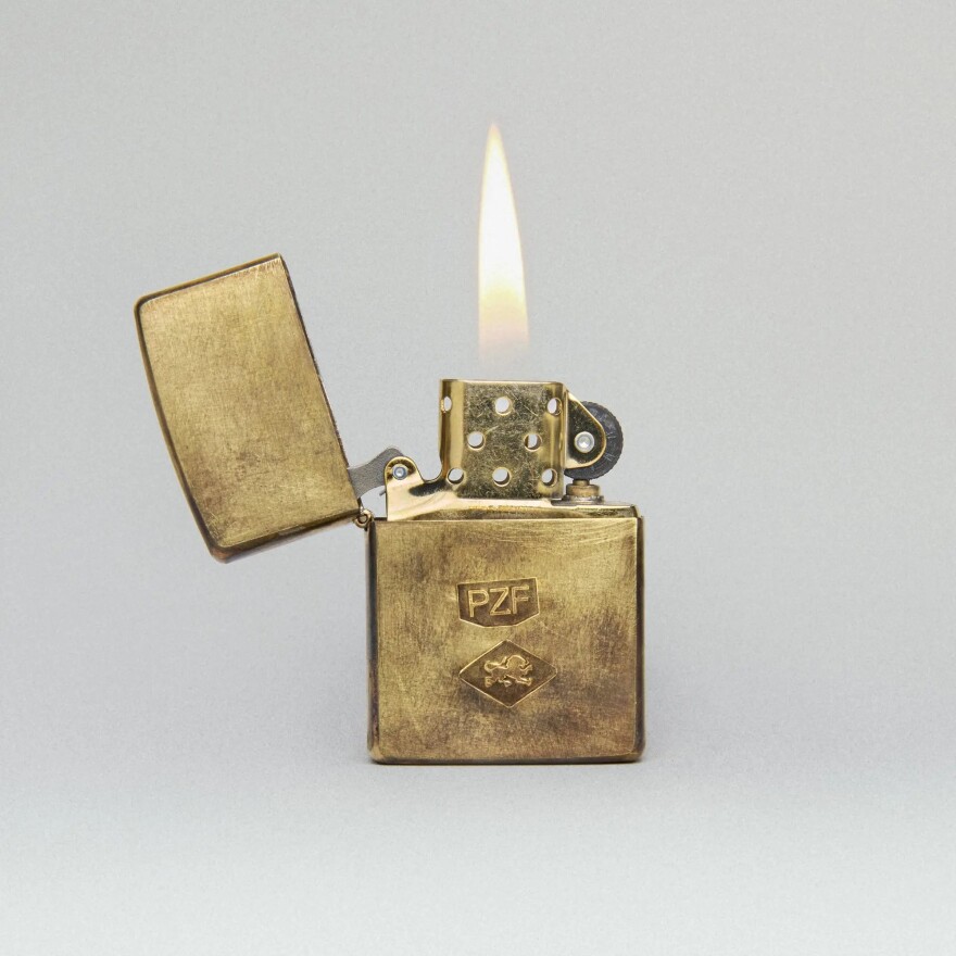 a still image of a lighter ignited 