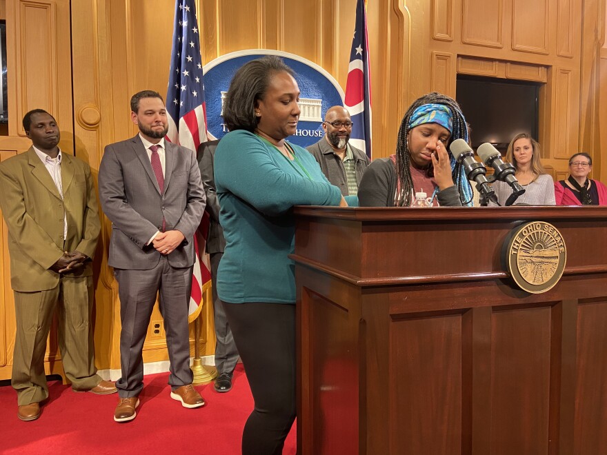 Crystal Brown, left, comforts her 15 year old daughter Josephine Brown-Walker as she talks about her EdChoice voucher, which allows her to attend a Christian high school in Columbus.