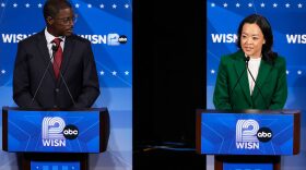 Democratic gubernatorial candidate Francesca Hong, right, talks as David Crowley listens during a primary debate in Milwaukee, Tuesday, July 28, 2026. (AP Photo/Nam Y. Huh)