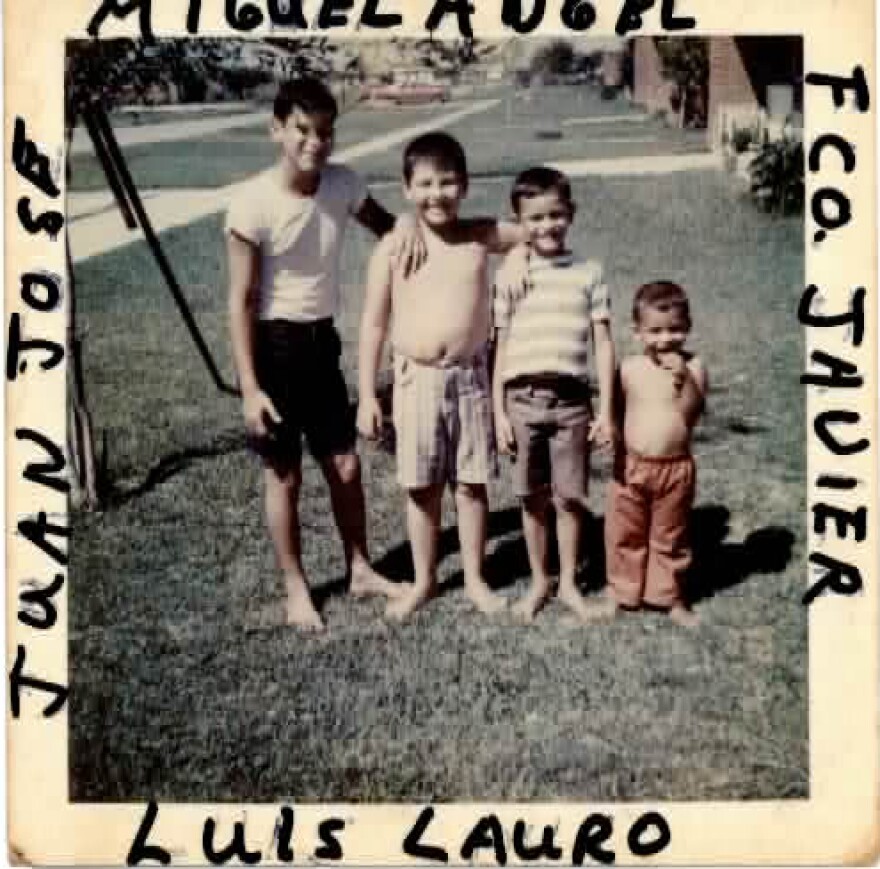 Guajardo and his brothers pose near their home in federal housing.