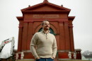 Jon Hughes, the 36-year-old owner of Hughes Funeral Alternatives, on Friday, Jan. 26, 2024, outside of his newly-purchased cremation site in Northampton.