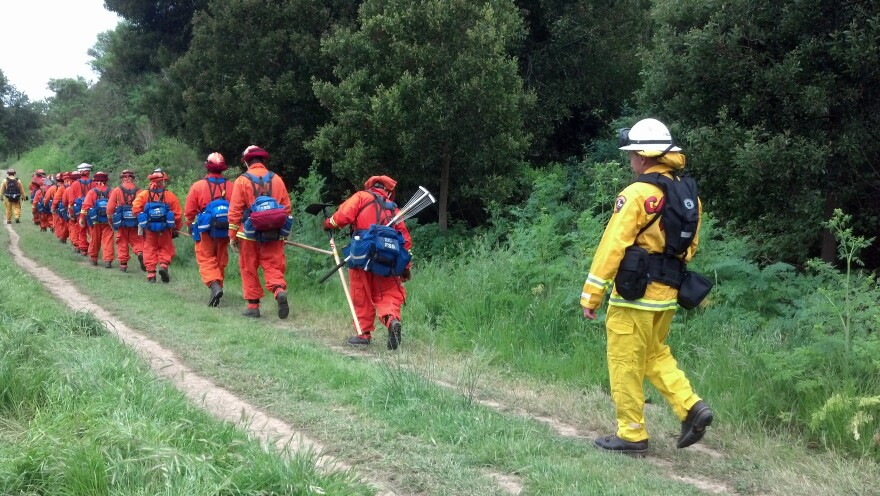 Incarcerated firefighters on a hike.