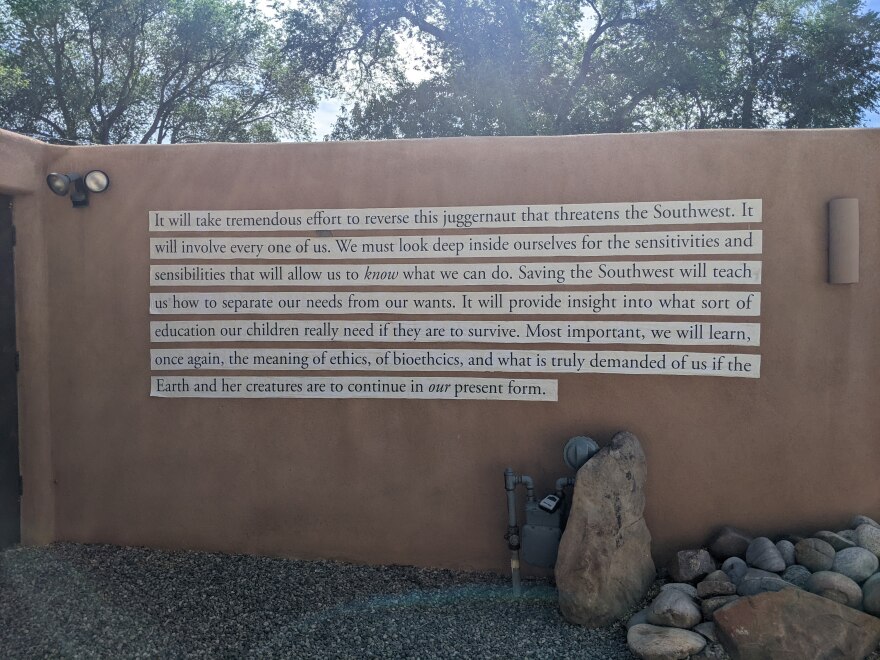 An excerpt of Jack Loeffler's writing is pasted on the exterior of H+H Arts. 
