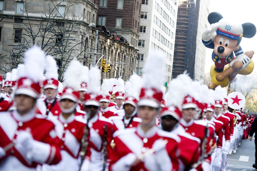 The Sailor Mickey balloon floats in the Macy's Thanksgiving Day Parade in New York, Thursday, Nov. 22, 2012. The American harvest holiday came as portions of the Northeast were still coping with the wake of Superstorm Sandy, and volunteers planned to serve thousands of turkey dinners to people it left homeless or struggling. (AP Photo/Charles Sykes)