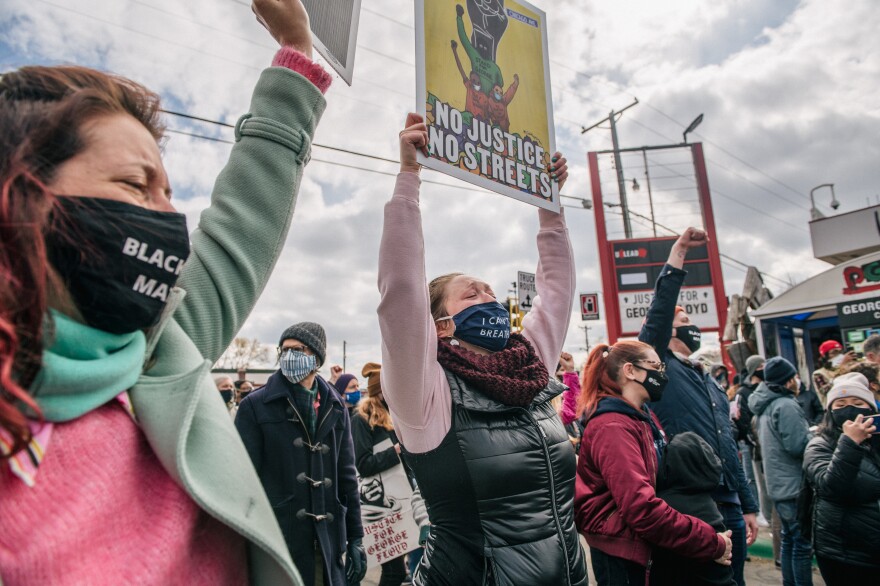 People celebrate after hearing the verdict in Derek Chauvin trial at the intersection of 38th Street and Chicago Avenue on in Minneapolis, Minnesota.