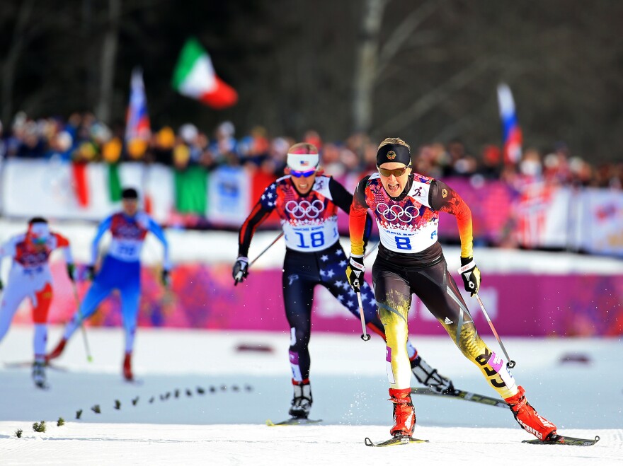 Kikkan Randall of the United States (left) and Denise Herrmann of Germany compete in the finals of the Ladies' Sprint Free during the Winter Olympics in Sochi, Russia.