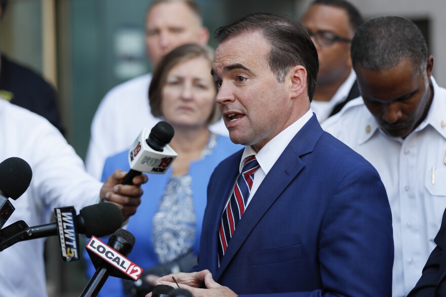 John Cranley speaks to the media as emergency personnel and police work the scene of a shooting Thursday near Fountain Square. Council had to hold a meeting that day because Friday is the deadline for the city to submit issues for the November ballot.