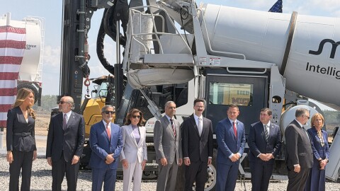 Photos of the ceremony to mark the first pouring of concrete at Micron's massive computer chip fabrication plant in the town of Clay, NY. 
