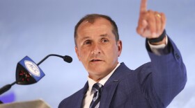 Atlantic Coast Conference commissioner Jim Phillips speaks during the NCAA college football ACC media days in Charlotte, N.C., Wednesday, July 21, 2021. (AP Photo/Nell Redmond)