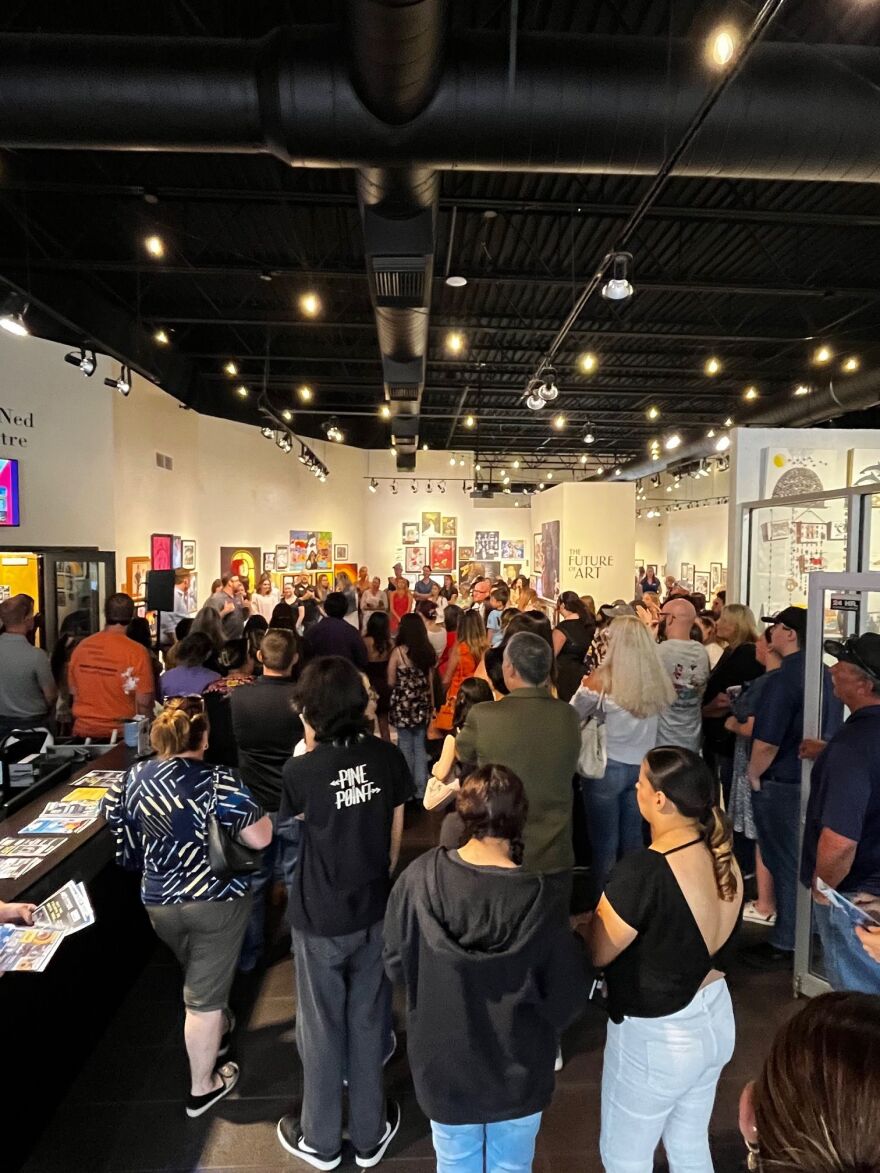 Visitors during opening reception for 'Future of Art' exhibition