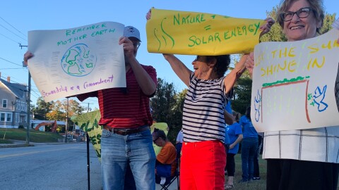Worshippers at Temple Bnai Israel in Willimantic hold a rally in favor of solar energy on October 6, 2025.