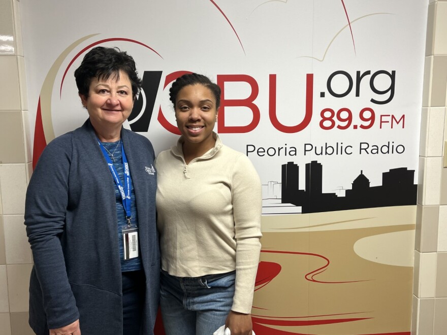 Theresa Koehler (left) and Justice Hobson (right) from the Peoria Cradle to Career Initiative at Illinois Central College.