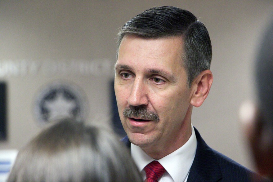 District Attorney Steve Kunzweiler talks to the media Friday, Oct. 30, 2015, after District Judge James Caputo recused himself from hearing Robert Bates manslaughter case.