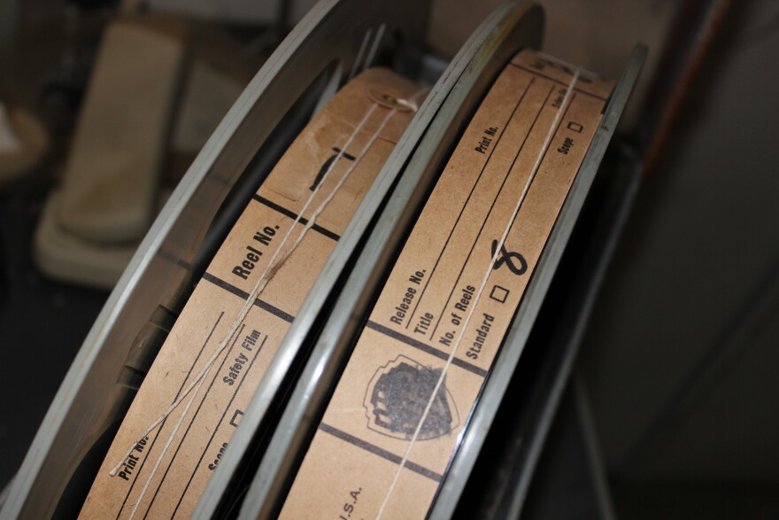 A close up of a movie film roll. The Warner Bros logo is still visible.