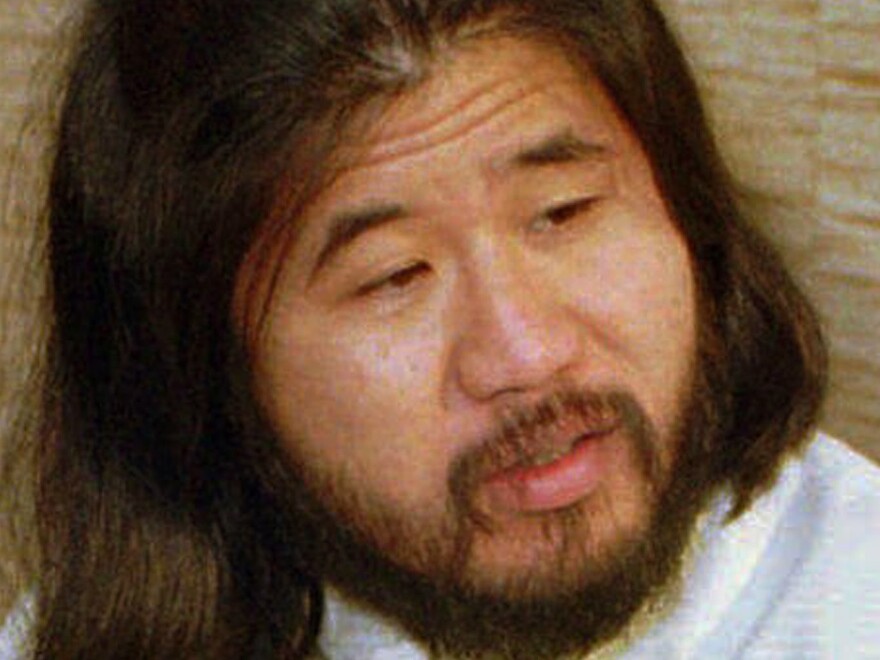 In Shoko Asahara's eight-year trial, he spoke incoherently and never explained the motive for the attacks or acknowledged responsibility. He is seen here in 1989 in Bonn, Germany.