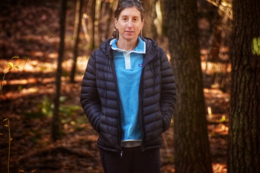 Researcher Kathy Zeller in the woods of Hatfield, Massachusetts, where bears are known to roam.