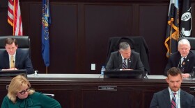 Lackawanna County Commissioner Thom Welby, right, rebuts claims by Commissioner Bill Gaughan, left, as Gaughan and Commissioner Chris Chermak listen during the Board of Commissioners reorganization meeting Jan. 5, 2026 at the county Government Center. In the foreground are county Deputy Chief of Staff Traci Harte and county solicitor Paul James Walker.