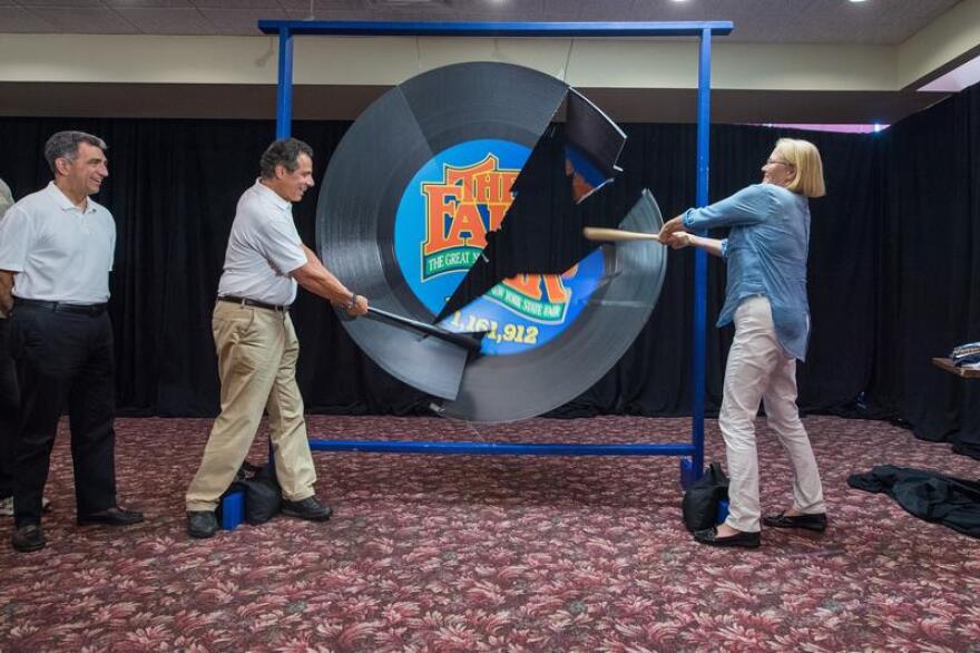 Gov. Cuomo and Onondaga County Executive Joanie Mahoney smash a record signifying a new all-time attendance record at the New York State Fair GOVERNORANDREWCUOMO / FLICKR