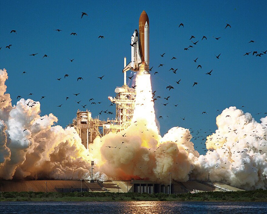 Challenger launches at the start of the 25th mission of NASA's Space Shuttle program. The shuttle would explode 73 seconds after this photo was taken.
