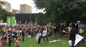 Educator and poet A Scribe Called Quess addresses protesters before they march through the French Quarter. June 1, 2020.