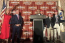 Shawn Oliver delivered a victory speech at the Sheraton Boston Hotel in September. He has now suspended his campaign.