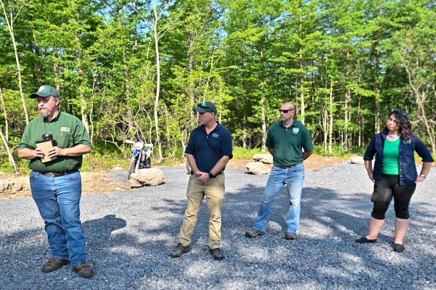 Representatives from the Pennsylvania Department of Conservation and Natural Resources discuss the opening of Catawissa South in Delano Twp.