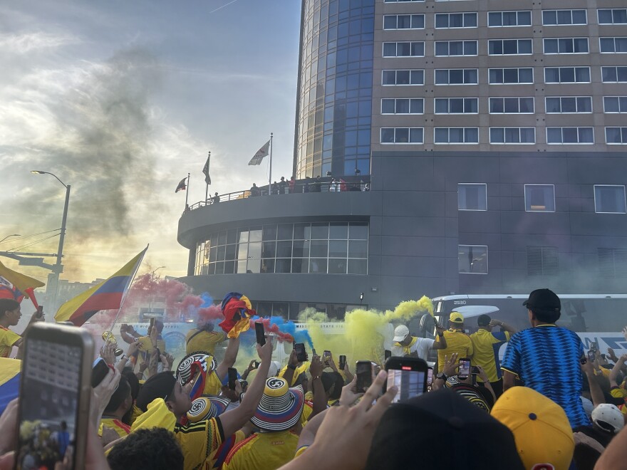 Colombia fans cheer on the country's national team Thursday at the Marriott Country Club Plaza, where the team is staying, ahead of Friday's World Cup match against Ghana.