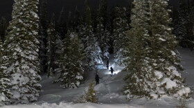 A group prepares to participate in a hike/ ski event to commemorate a World War II battle at the top of the Teton Pass February 18, 2024. The original ascent of the 86th Mountain Infantry’s 1st Battalion ascended Riva Ridge, took place on February 18, 1945. The soldiers trained with 90 packs, so the participants carried almost equally heavy packs. The event was organized by Christian Beckwith, and took place in three locations: Mt. Glory, Jackson Hole; Whiteface Mountain, New York; Ski Cooper, Colorado. Photo by Natalie Behring