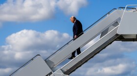 FILE - President Donald Trump disembarks Air Force One at Palm Beach International Airport, Jan. 16, 2026, in West Palm Beach, Fla. (AP Photo/Julia Demaree Nikhinson, File)